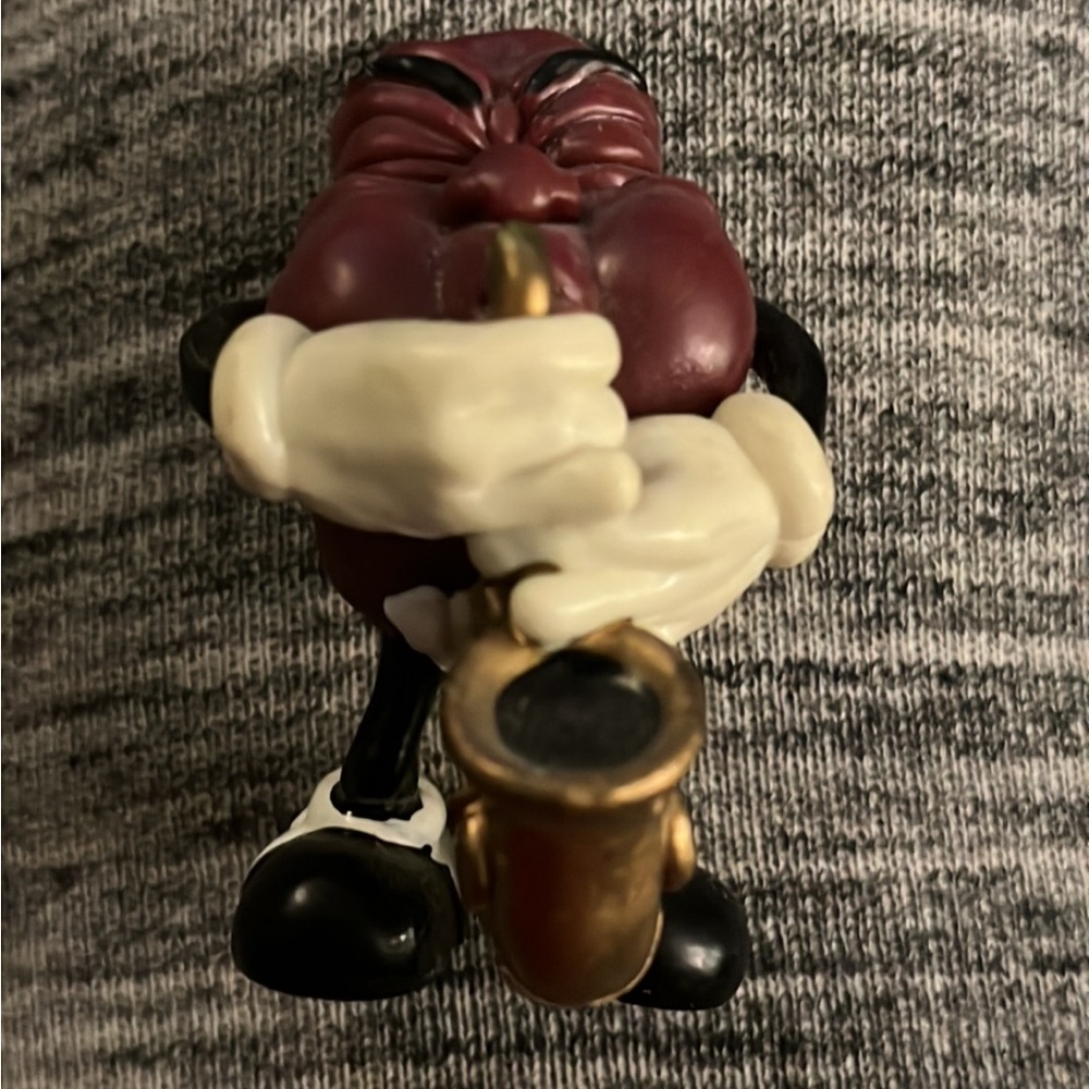 Saxophone Playing Character Figurine
